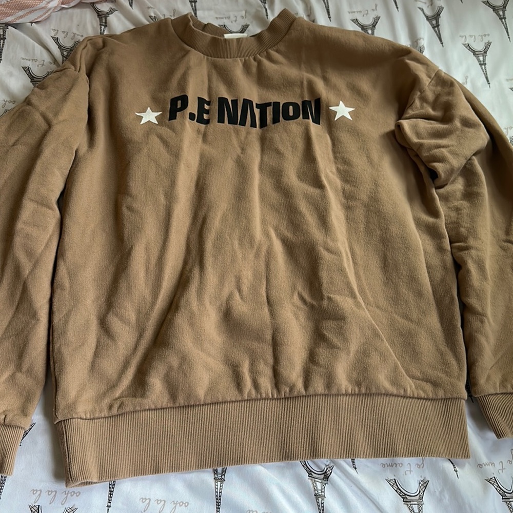H and M collaboration with P.E NATION sweatshirt in a great quality